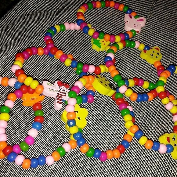 9 wooden beaded children's bracelets - Picture 1 of 7